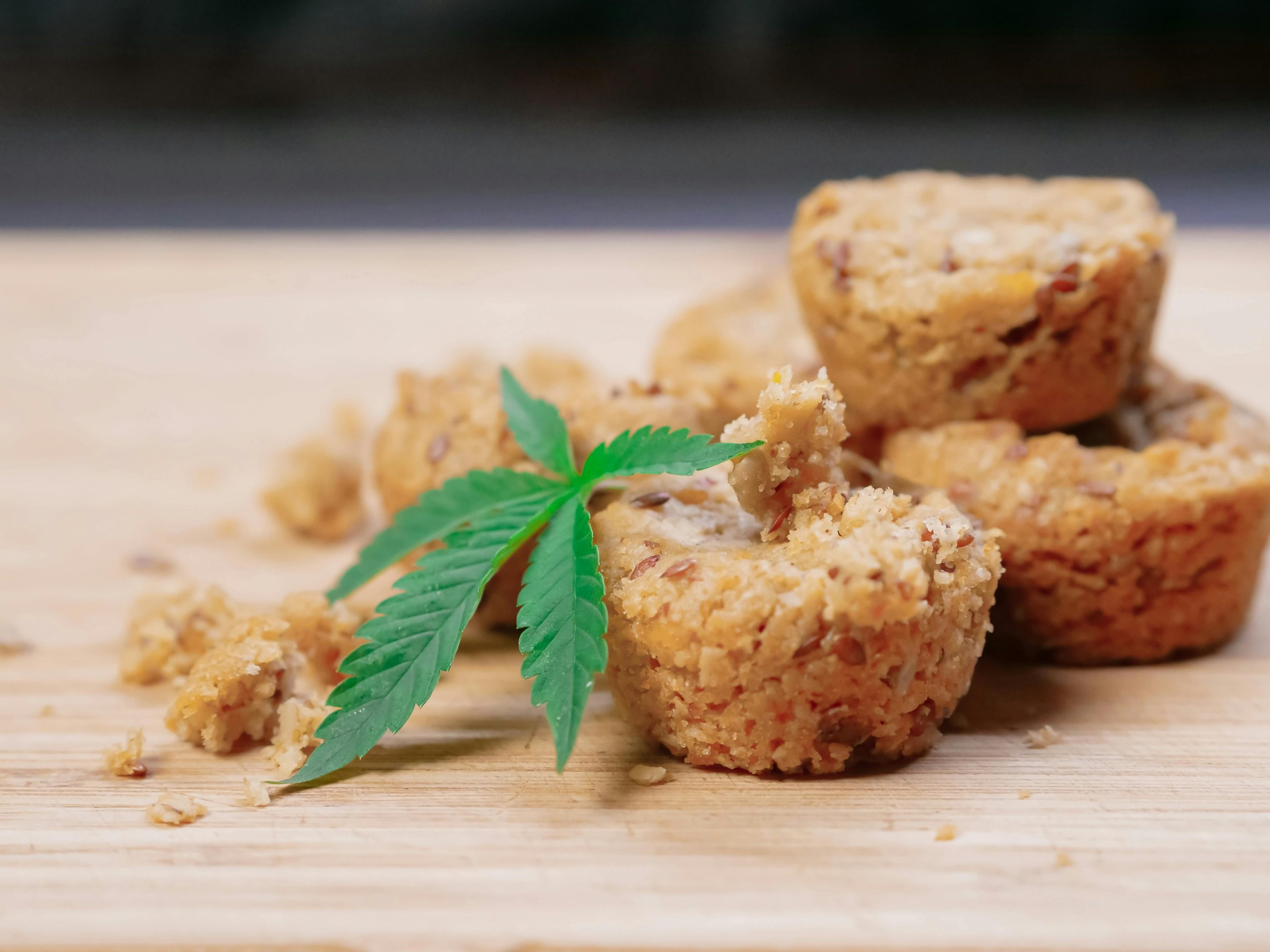 A shot of hemp muffins with a hemp leaf